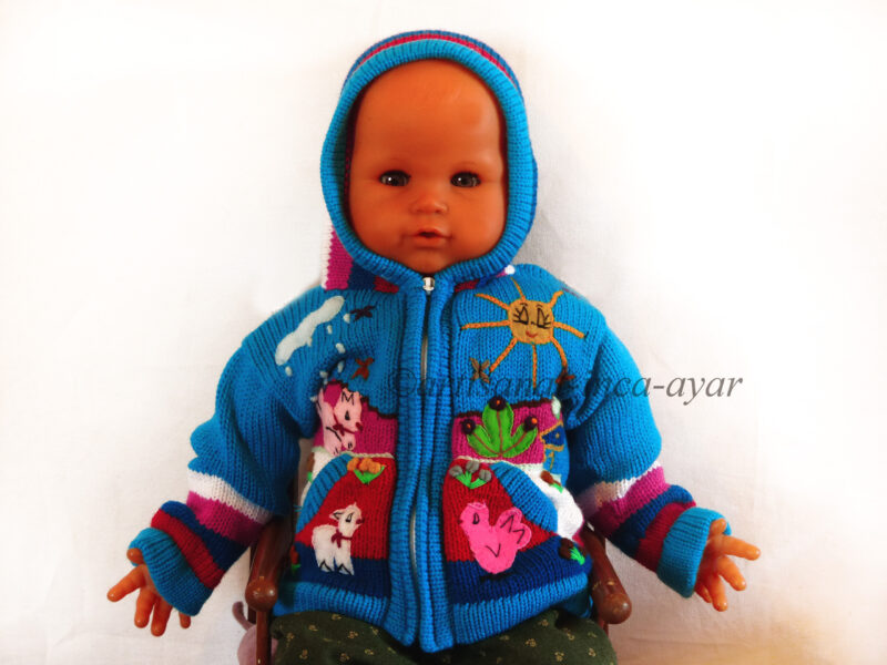 Gilet péruvien bébé 3/9 mois. couleurs turquoise, rose et blanc